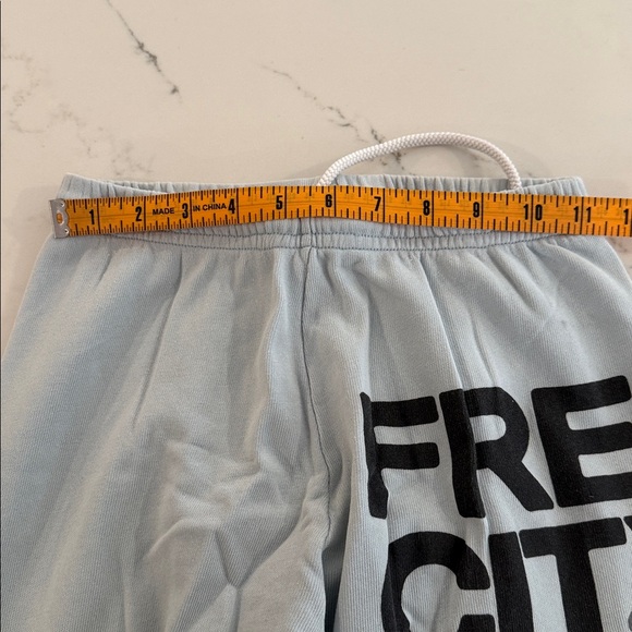 FreeCity Light Blue Sweatpants with Black Print - Picture 3 of 4